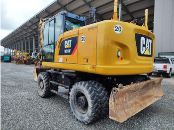 Escavadeira de rodas CATERPILLAR M318F