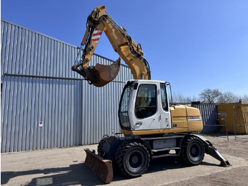 Escavadeira de rodas LIEBHERR A 314