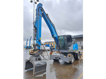 Manipulador de material para transporte de lixo Fuchs MHL 310: foto 2