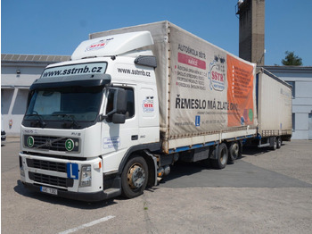 Caminhão com lona VOLVO FM 380
