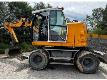 Escavadeira de rodas LIEBHERR A 910