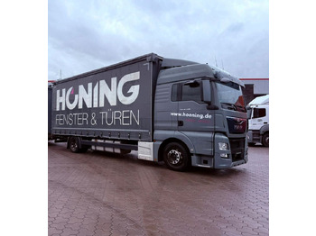 Caminhão com lona MAN TGX 18.440