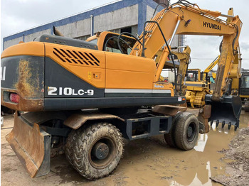 Escavadeira de rodas HYUNDAI R210