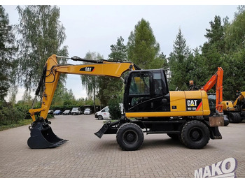 Escavadeira de rodas CATERPILLAR M313D
