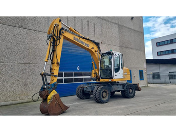 Escavadeira de rodas LIEBHERR A 314
