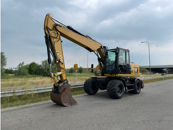 Escavadeira de rodas Caterpillar M313D - CE: foto 3