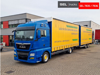 Caminhão com lona MAN TGX 18.500