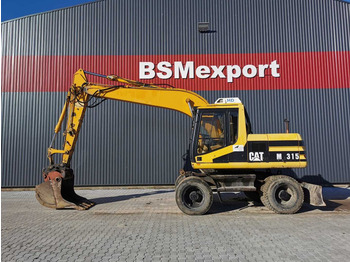 Escavadeira de rodas CATERPILLAR M315