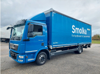 Caminhão com lona MAN TGL 12.250