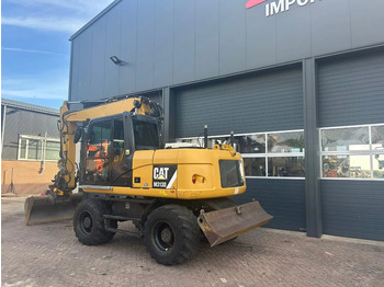 Escavadeira de rodas Caterpillar M313D: foto 2 Escavadeira de rodas Caterpillar M313D: foto 2