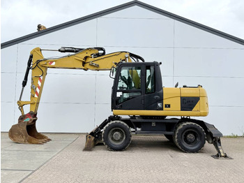 Escavadeira de rodas CATERPILLAR M313D