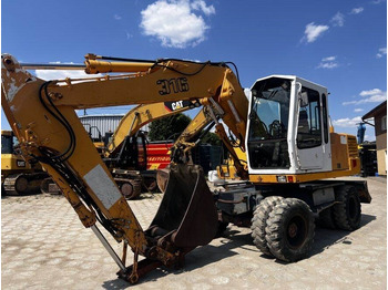 Escavadeira de rodas LIEBHERR A 316
