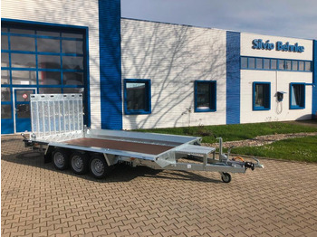 Reboque porta máquinas