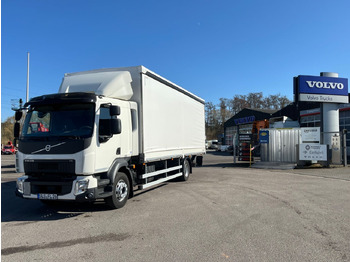 Caminhão com lona VOLVO FL