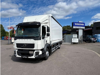 Caminhão com lona VOLVO FL