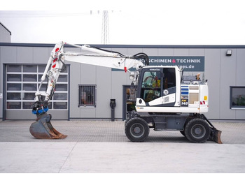 Escavadeira de rodas KOMATSU PW148-11