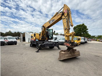 Escavadeira de rodas CATERPILLAR M322C