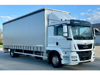 Caminhão com lona MAN TGM 18.290
