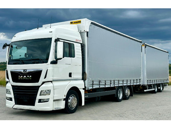 Caminhão com lona MAN TGX 26.460