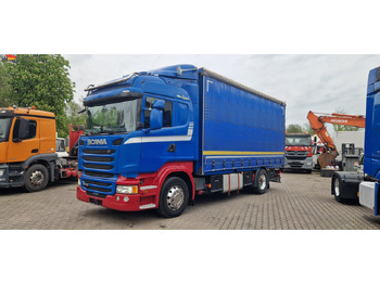 Caminhão com lona SCANIA R 410