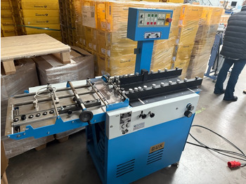 Máquina de dobrar papel