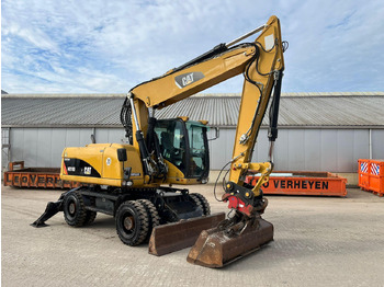 Escavadeira de rodas CATERPILLAR M318D