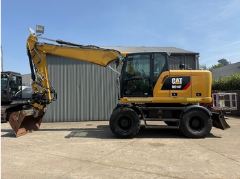 Escavadeira de rodas CATERPILLAR M314F
