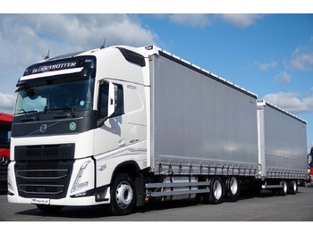 Caminhão com lona VOLVO FH 460