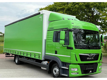 Caminhão com lona MAN TGL 12.250