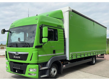 Caminhão com lona MAN TGL 12.250