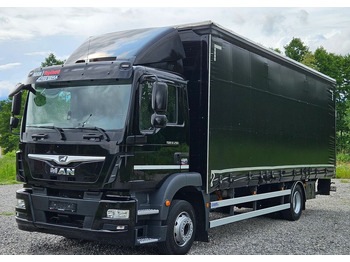 Caminhão com lona MAN TGM 12.290