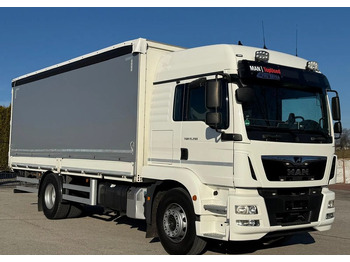 Caminhão com lona MAN TGM 15.290