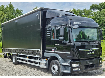 Caminhão com lona MAN TGM 15.290