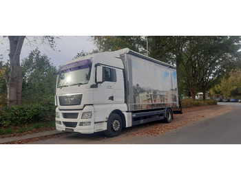 Caminhão com lona MAN TGX 18.360