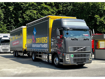 Caminhão com lona VOLVO FH 420