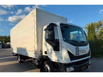 Caminhão com lona IVECO