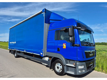 Caminhão com lona MAN TGL 12.250