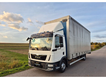Caminhão com lona MAN TGL 12.250