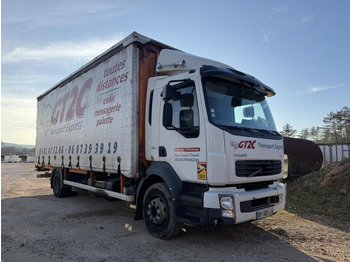 Caminhão com lona VOLVO FL