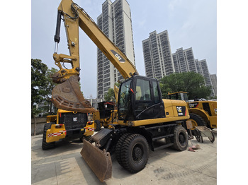 Escavadeira de rodas CATERPILLAR M320