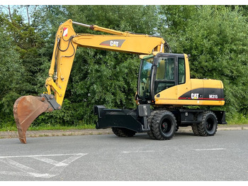 Escavadeira de rodas CATERPILLAR M315C