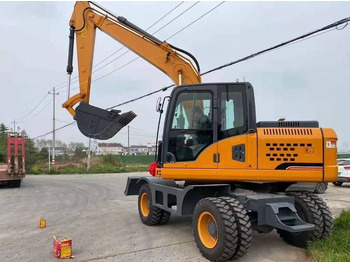 Escavadeira de rodas CUMMINS