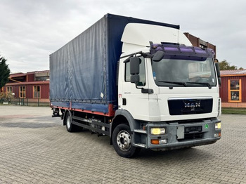 Caminhão com lona MAN TGM 12.250