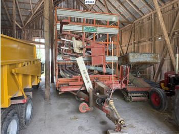 Máquina para produção de feno