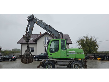 Escavadeira de rodas LIEBHERR A 316