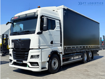 Caminhão com lona MAN TGX