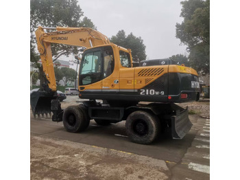Escavadeira de rodas HYUNDAI R210