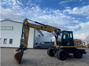 Escavadeira de rodas CATERPILLAR M313D