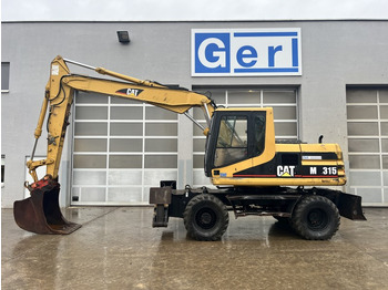 Escavadeira de rodas CATERPILLAR M315