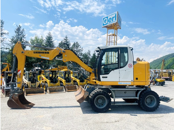 Escavadeira de rodas LIEBHERR A 910